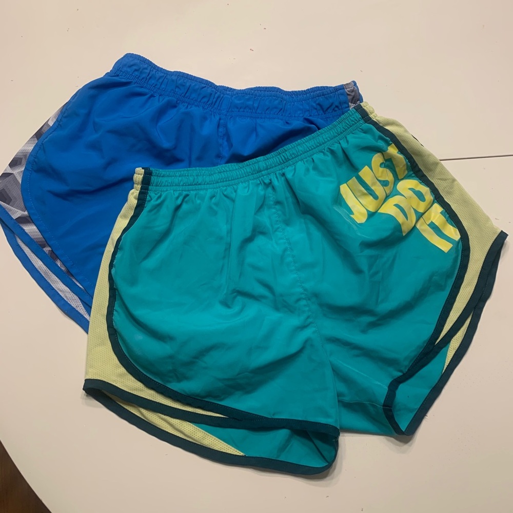 2 pairs of Nike running shorts